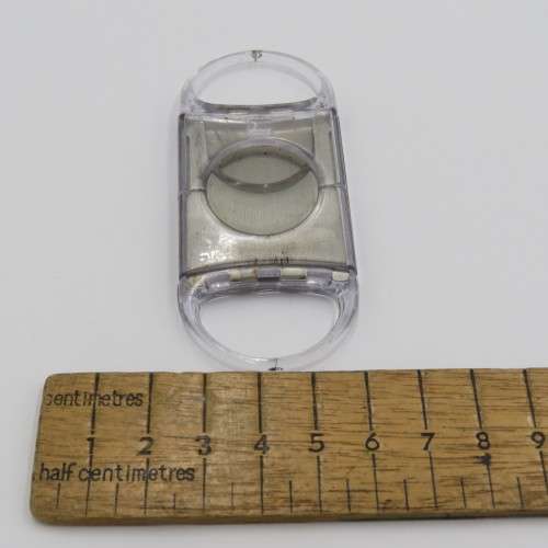 Plastic and metal cigar cutter