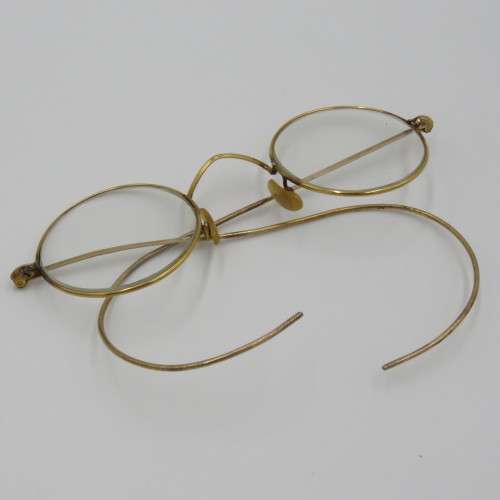 Pair of antique goldplated spectacle glasses in case