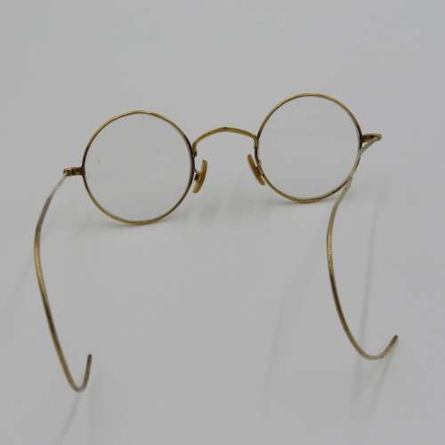 Pair of antique goldplated spectacle glasses in case