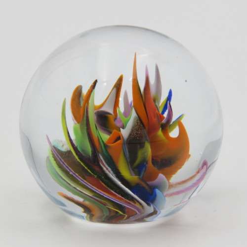 Vintage small handmade glass paperweight with multi-color swirls