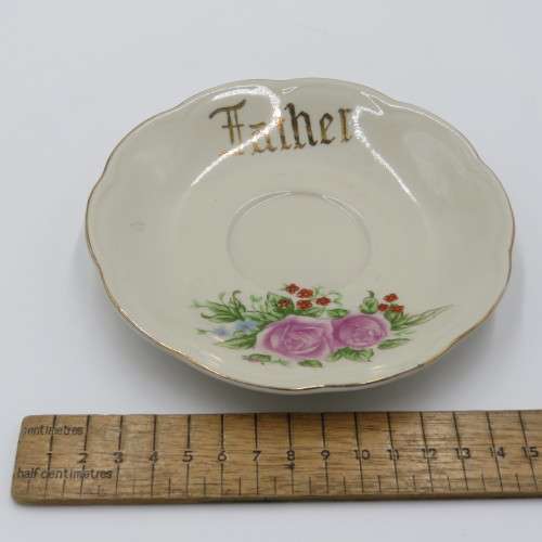 Porcelain Father tea cup and saucer