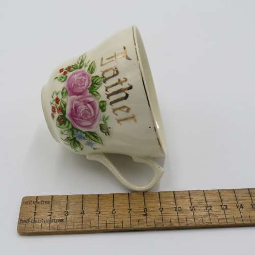 Porcelain Father tea cup and saucer