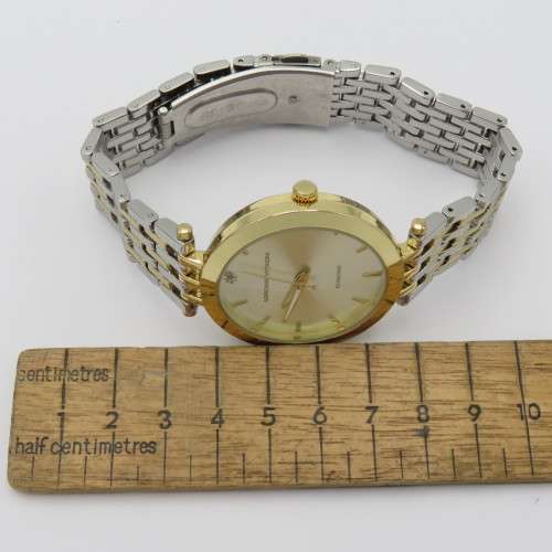 Adrienne Vittadini Genuine diamond quartz ladies watch in box