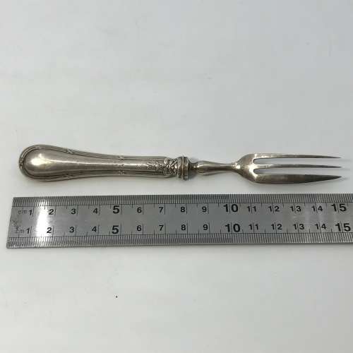 Beautiful fruit fork with British hallmarked silver handle