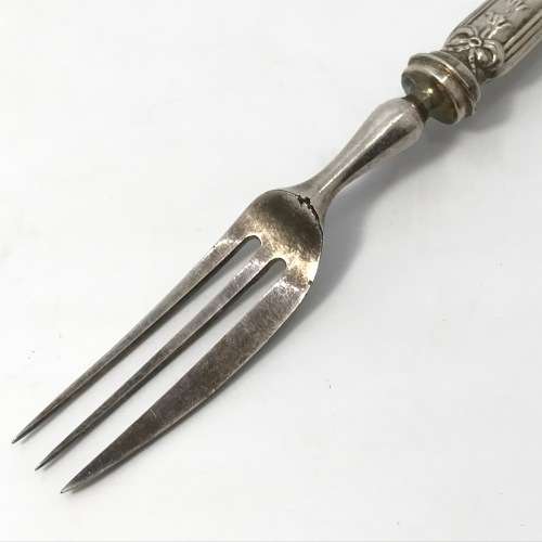 Beautiful fruit fork with British hallmarked silver handle