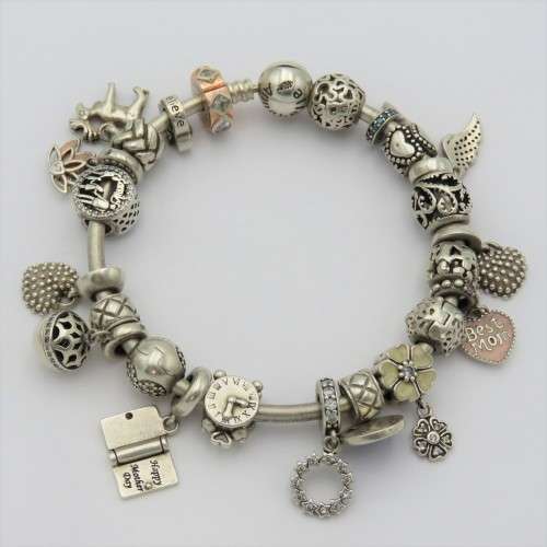 Annabelle sterling silver charm bangle/bracelet with charms - Weighs 61,1 grams - 18 cm
