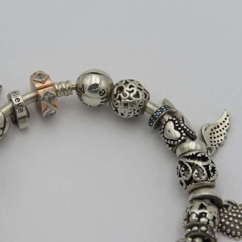 Annabelle sterling silver charm bangle/bracelet with charms - Weighs 61,1 grams - 18 cm
