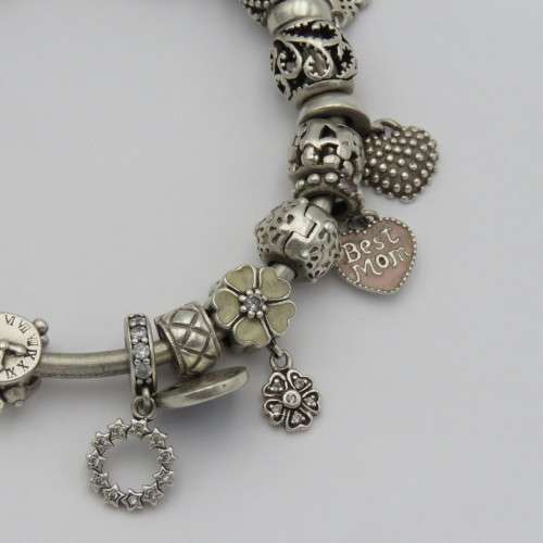 Annabelle sterling silver charm bangle/bracelet with charms - Weighs 61,1 grams - 18 cm