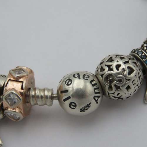 Annabelle sterling silver charm bangle/bracelet with charms - Weighs 61,1 grams - 18 cm