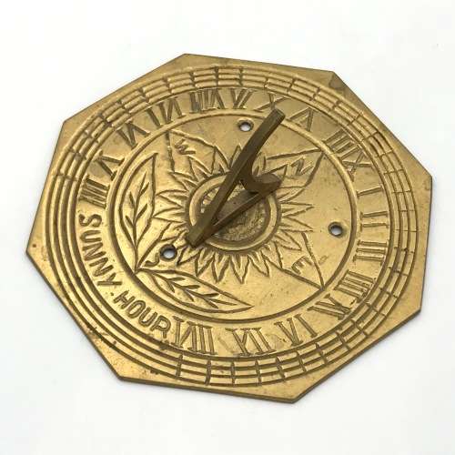 Vintage brass sundial/clock