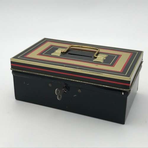 Vintage savings money box with key