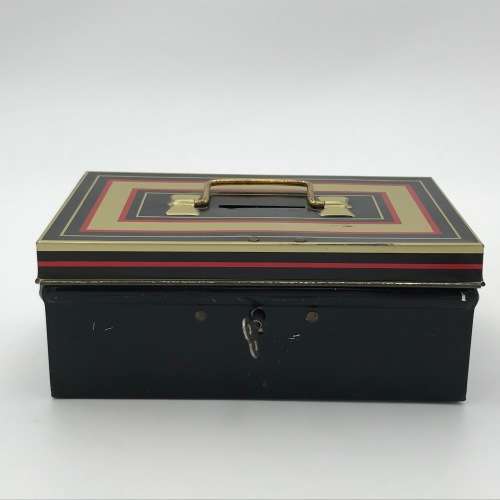 Vintage savings money box with key