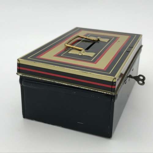 Vintage savings money box with key