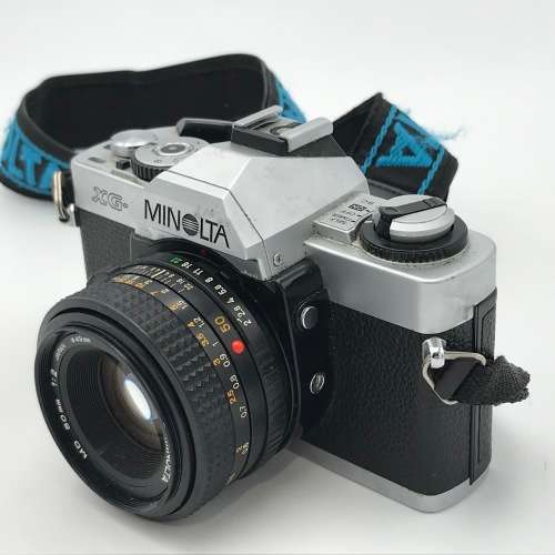 Vintage Minolta XG-A 35mm camera with 50mm 1:2 lens plus flash and Minolta 200mm 1:3,5 lens in bag