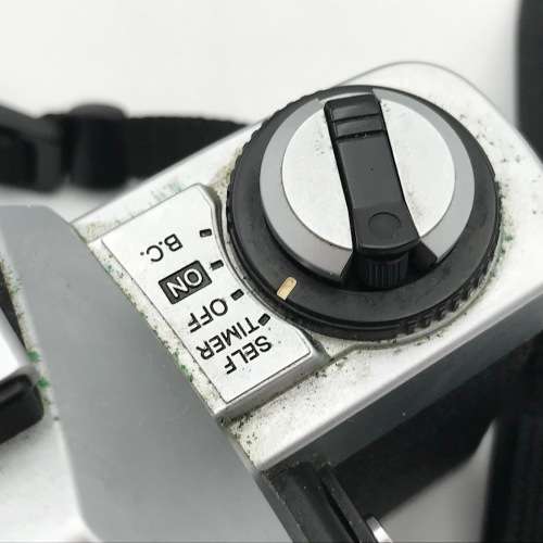 Vintage Minolta XG-A 35mm camera with 50mm 1:2 lens plus flash and Minolta 200mm 1:3,5 lens in bag