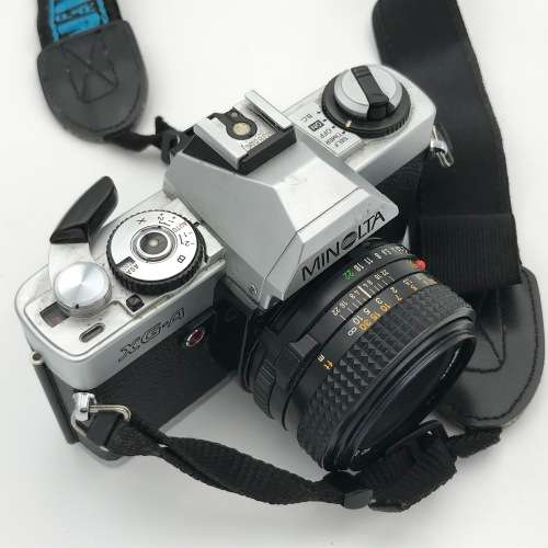 Vintage Minolta XG-A 35mm camera with 50mm 1:2 lens plus flash and Minolta 200mm 1:3,5 lens in bag