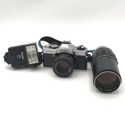 Vintage Minolta XG-A 35mm camera with 50mm 1:2 lens plus flash and Minolta 200mm 1:3,5 lens in bag