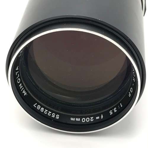 Vintage Minolta XG-A 35mm camera with 50mm 1:2 lens plus flash and Minolta 200mm 1:3,5 lens in bag