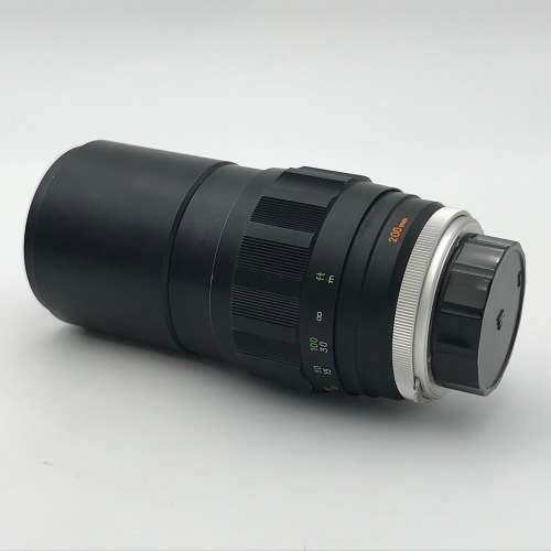 Vintage Minolta XG-A 35mm camera with 50mm 1:2 lens plus flash and Minolta 200mm 1:3,5 lens in bag