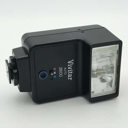 Vintage Minolta XG-A 35mm camera with 50mm 1:2 lens plus flash and Minolta 200mm 1:3,5 lens in bag