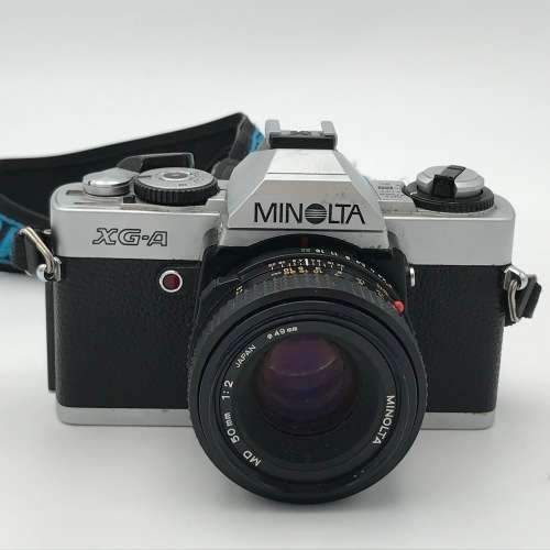 Vintage Minolta XG-A 35mm camera with 50mm 1:2 lens plus flash and Minolta 200mm 1:3,5 lens in bag