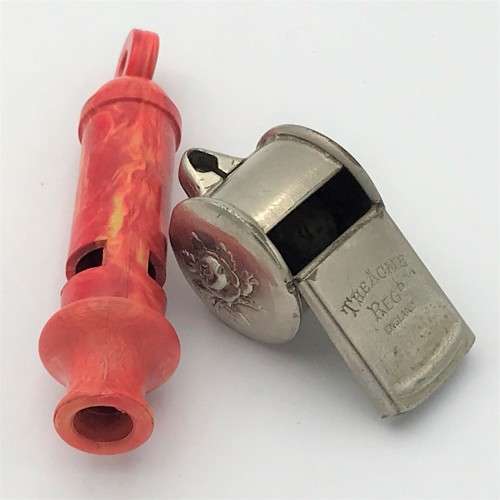 Pair of vintage whistles
