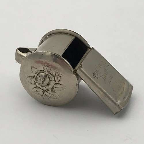 Pair of vintage whistles