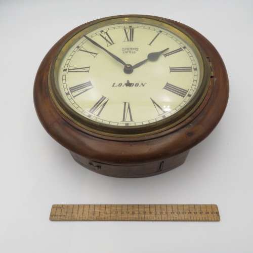 Antique Smiths Enfield London wall clock - Runs and stops