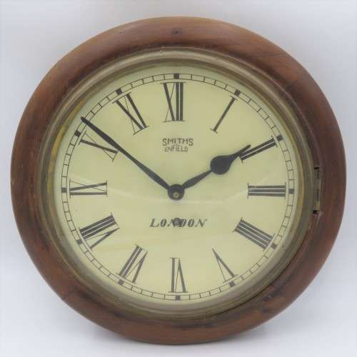 Antique Smiths Enfield London wall clock - Runs and stops