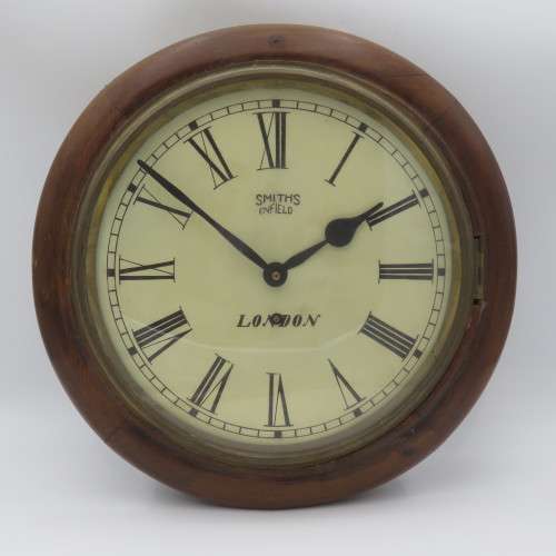 Antique Smiths Enfield London wall clock - Runs and stops
