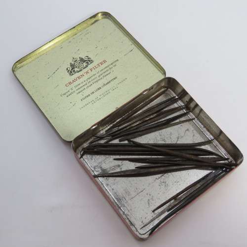 Lot of 22 leather making needles on vintage Craven-A tin