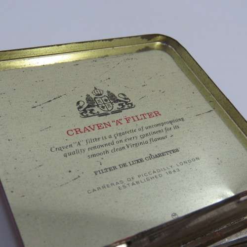 Lot of 22 leather making needles on vintage Craven-A tin