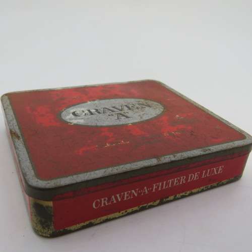 Lot of 22 leather making needles on vintage Craven-A tin