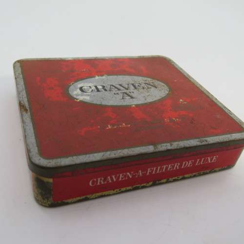 Lot of 22 leather making needles on vintage Craven-A tin