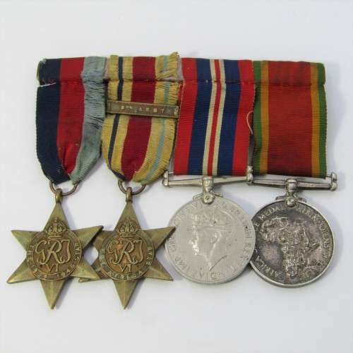 Set of 4 WW2 medals with 8th army clasp issued to M14580 G. Miller
