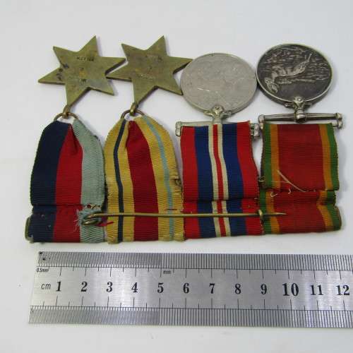 Set of 4 WW2 medals with 8th army clasp issued to M14580 G. Miller