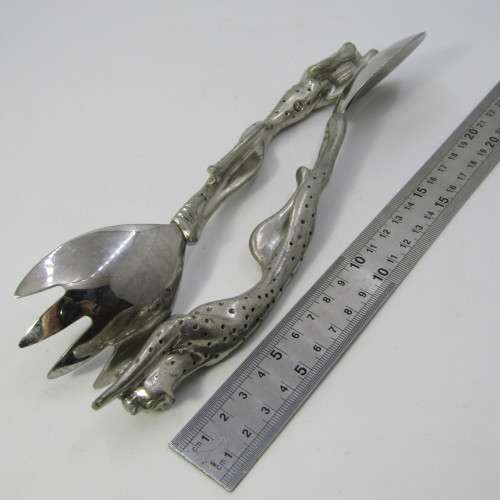 Pair of Diana Carmichael Cheetah salad servers