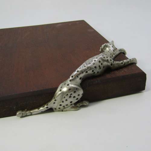 Diana Carmichael Cheetah cheese with knife