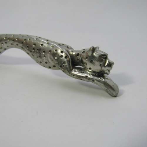 Diana Carmichael Cheetah cheese with knife