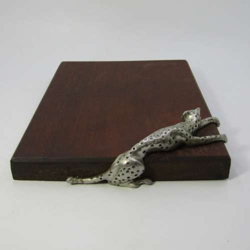 Diana Carmichael Cheetah cheese with knife