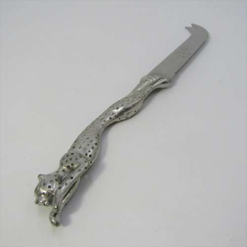 Diana Carmichael Cheetah cheese with knife