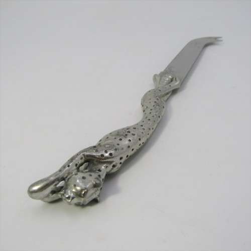 Diana Carmichael Cheetah cheese with knife