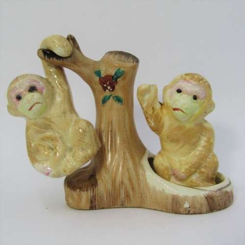 Pair of vintage Monkeys salt and pepper shakers on tree stand