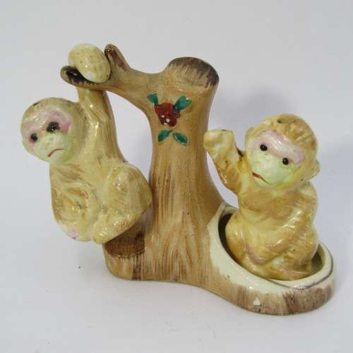 Pair of vintage Monkeys salt and pepper shakers on tree stand