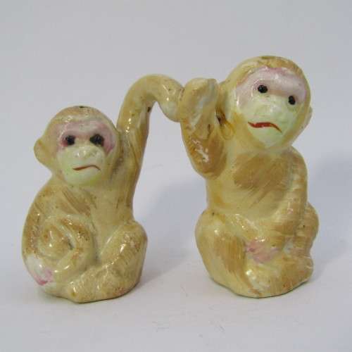 Pair of vintage Monkeys salt and pepper shakers on tree stand