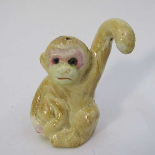 Pair of vintage Monkeys salt and pepper shakers on tree stand