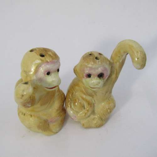 Pair of vintage Monkeys salt and pepper shakers on tree stand