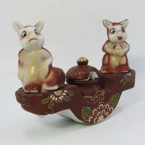 Vintage oriental squirrel salt and pepper shakers with mustard pot on stand