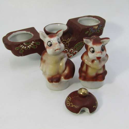Vintage oriental squirrel salt and pepper shakers with mustard pot on stand