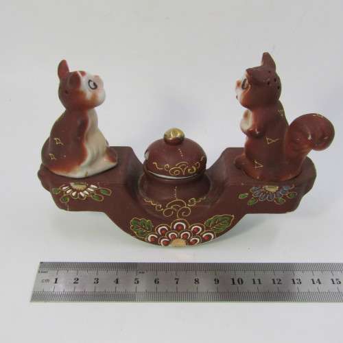 Vintage oriental squirrel salt and pepper shakers with mustard pot on stand